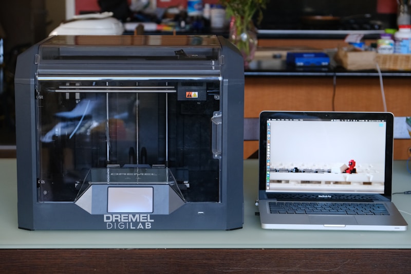 Close-up of a 3D printer extruder working on a detailed print