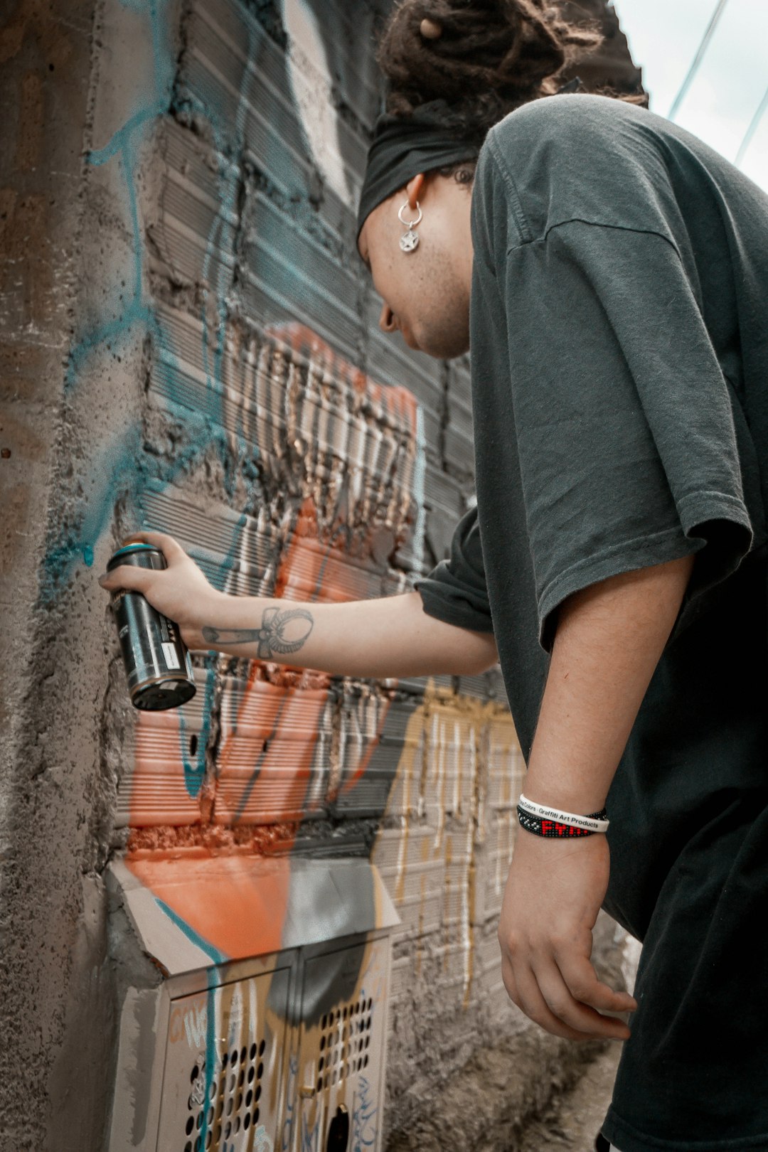 Spray painting workspace with various colors