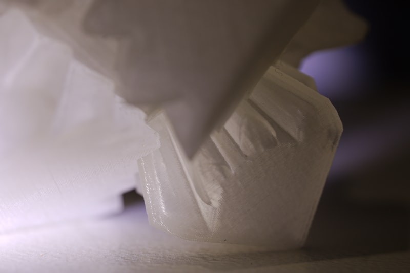 Resin 3D prints under UV curing light