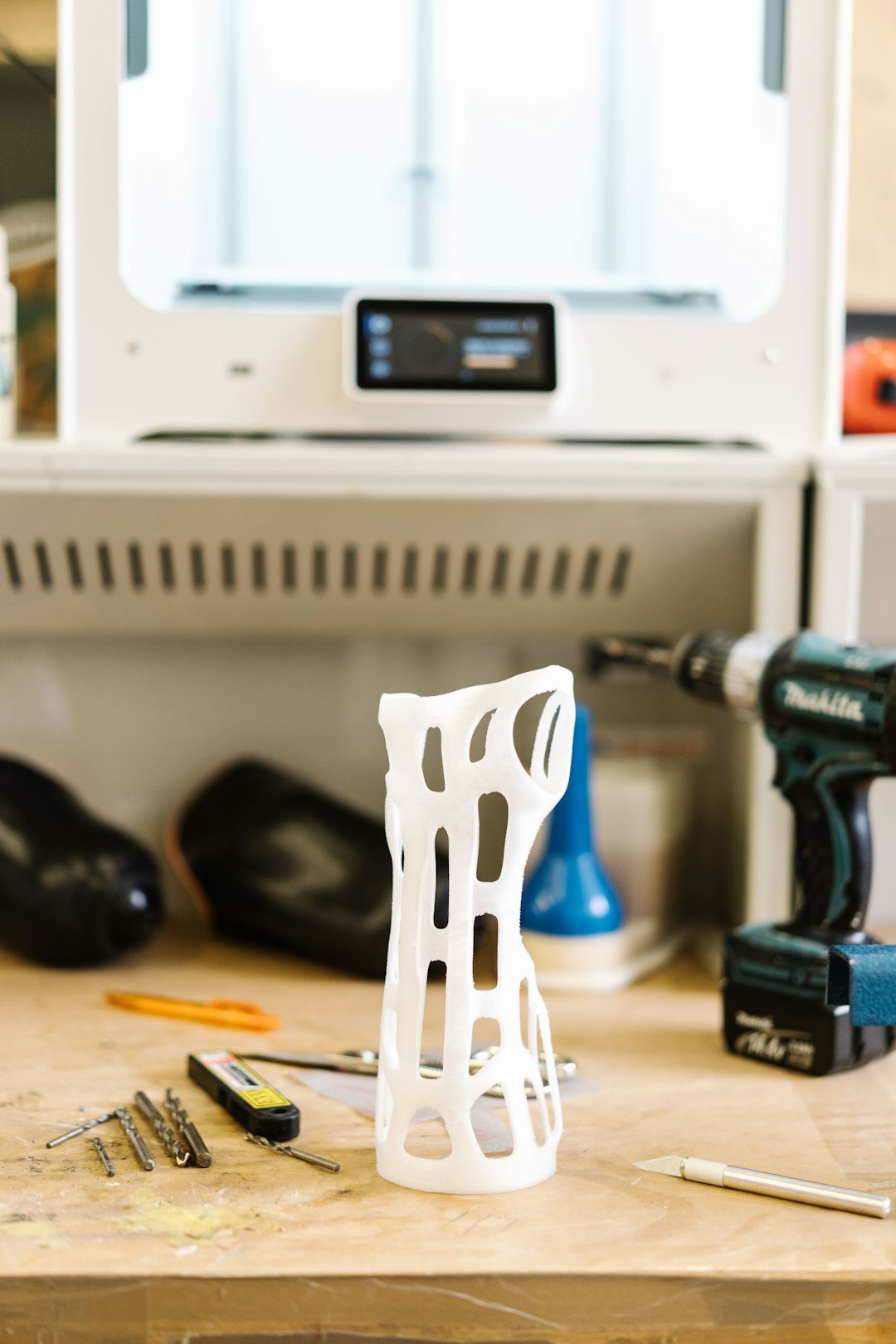 3D printer workshop with multiple machines running