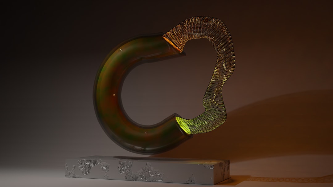 Metal-filled 3D printed objects showing metallic bronze and copper finishes after polishing