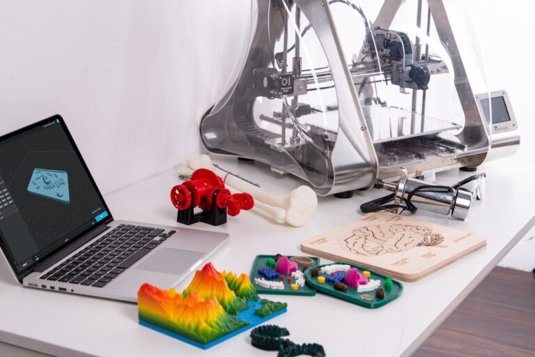 Colorful 3D printing filament spools on shelf